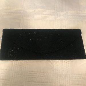 Vintage black beaded clutch in new condition